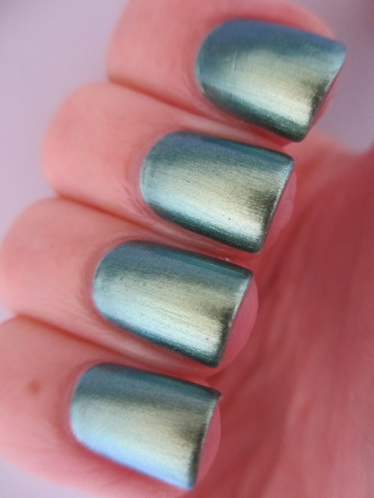 Claire's-Dollar-blue-green-duochrome-swatch-nail-polish