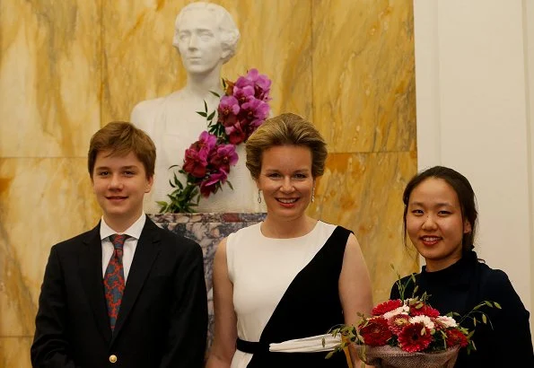 Queen Mathilde wore Carolina Herrera two-tone crepe dress