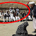 All male Afghan-audience watching a woman receiving 100 lashes for entertainment