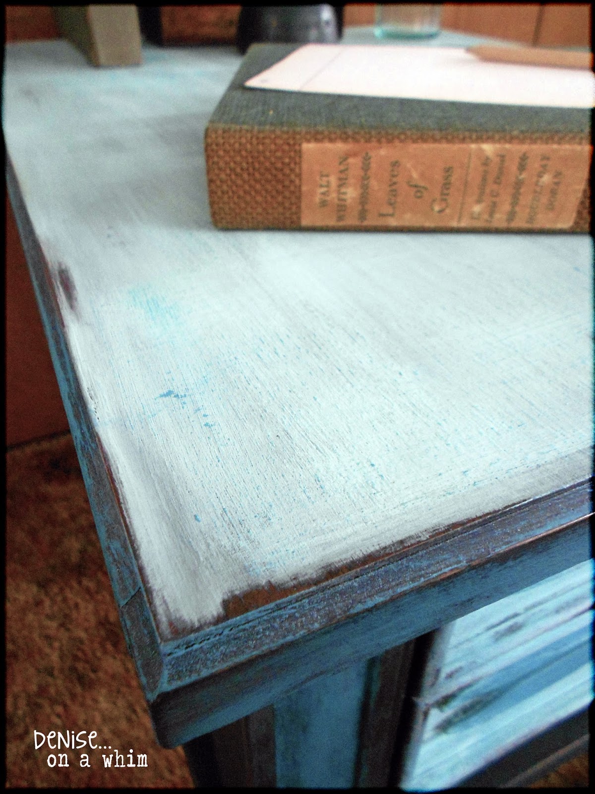 Light distressing on the edges of an end table via http://deniseonawhim.blogspot.com
