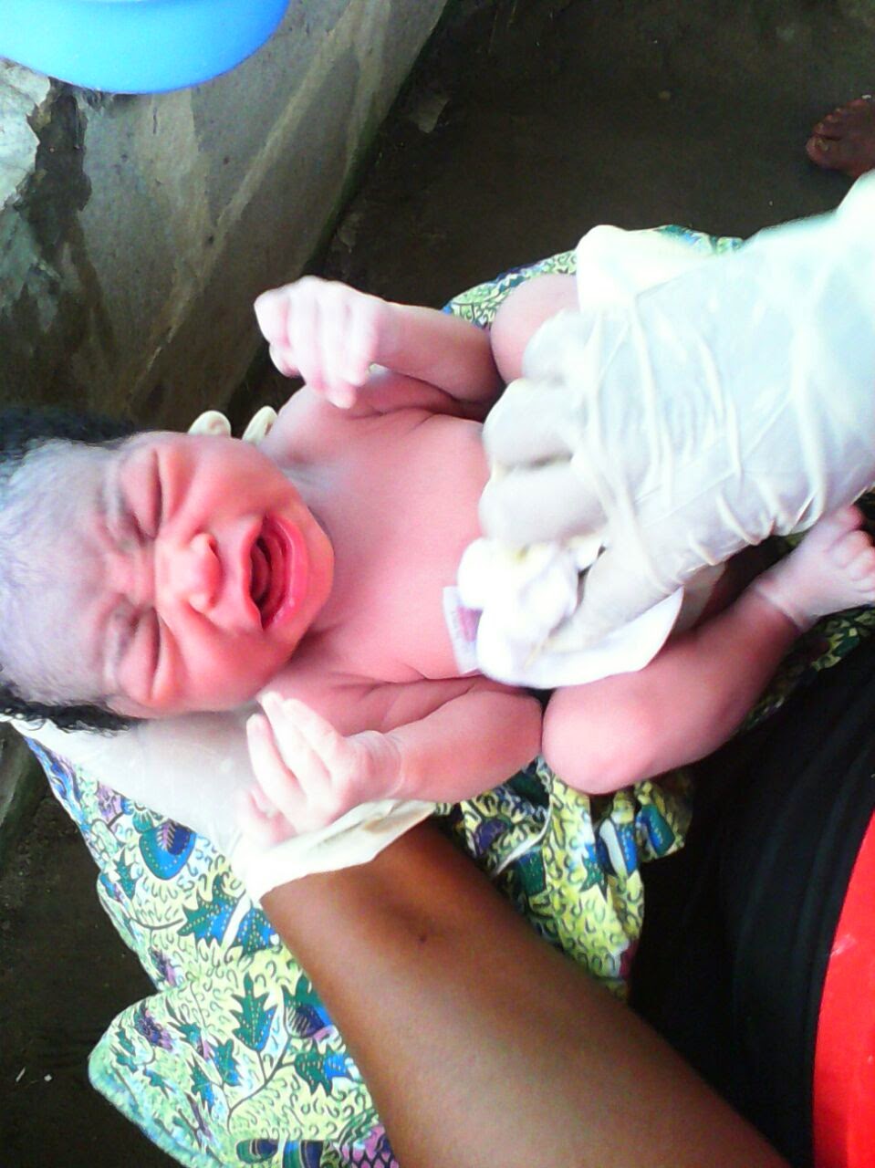 woman delivers baby streets lagos