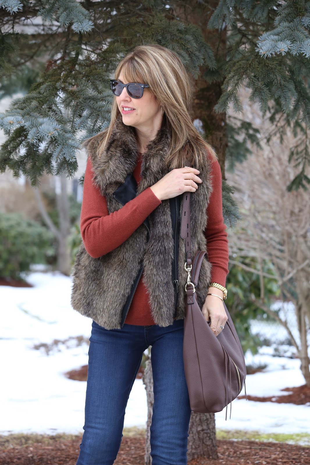 Faux fur vest and cozy sweater - The Midlife Fashionista