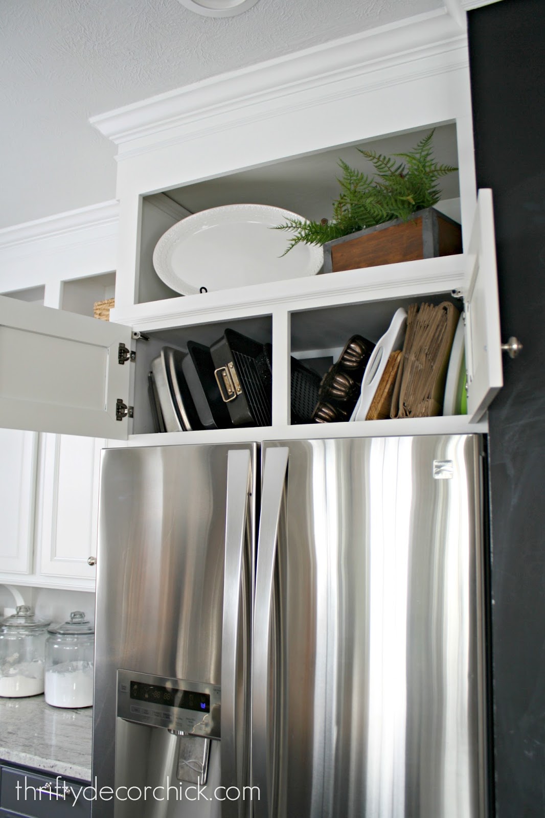 How To Organize Awkward Pans Above The Fridge Thrifty Decor Diy And Organizing Organize Awkward Pans Above The Fridge, Over Fridge Storage Solutions
