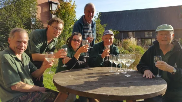 Britain in Bloom. Members of the Cricklepit Mill Garden Group celebrate their Britain  in Bloom Award;