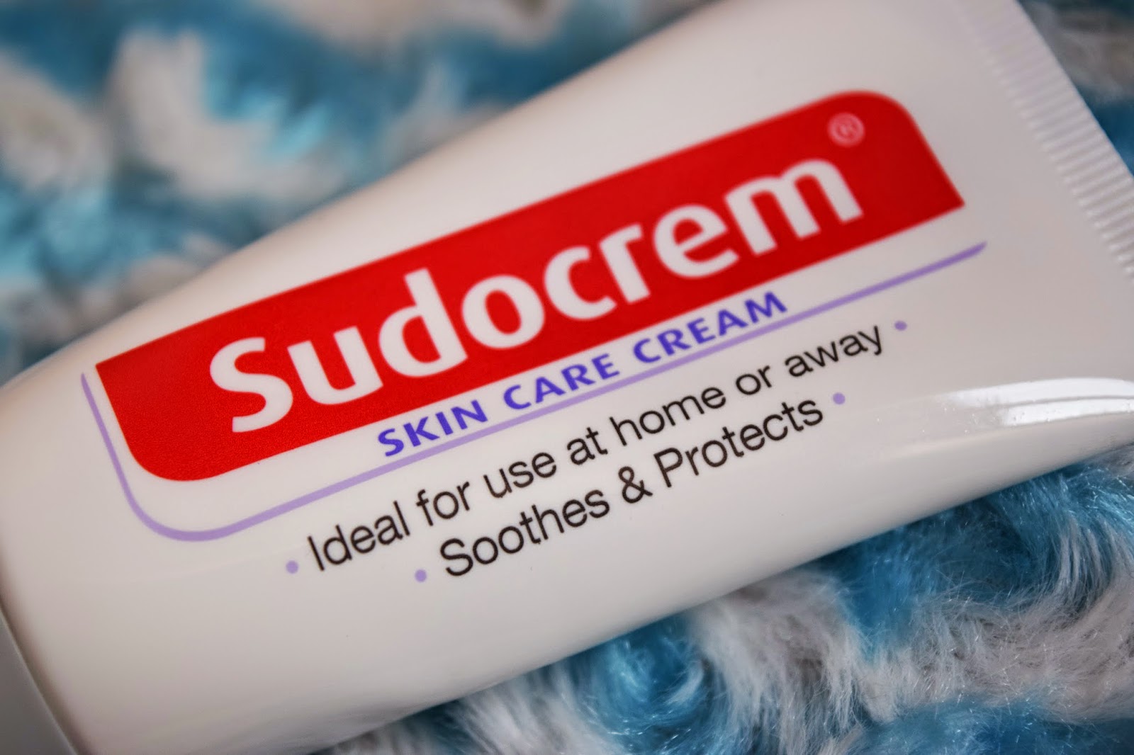 a close up shot of the logo on the tube of Sudocrem Skin Care Cream