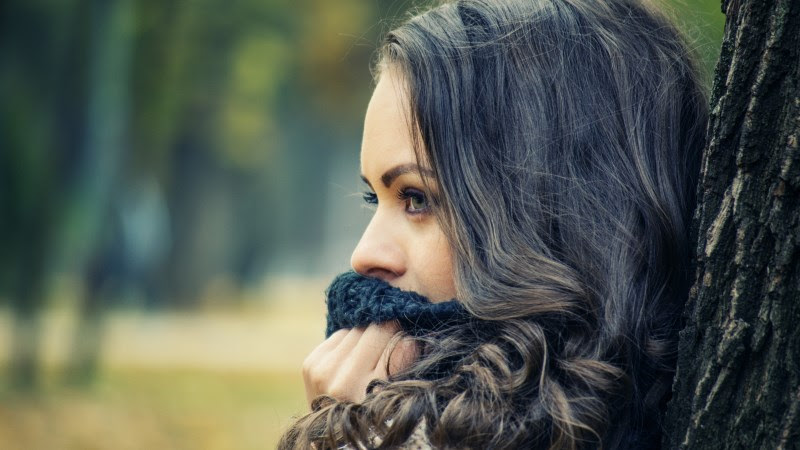 Beautiful Girl with Green Eyes looking away