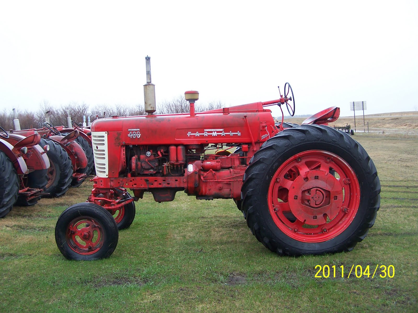 different-coloured-junk-farmall-400-diesel