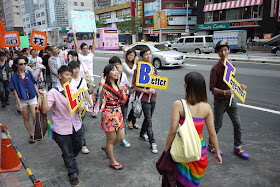 paraders carrying signs at 2011 Taiwan LGBT Pride Parade