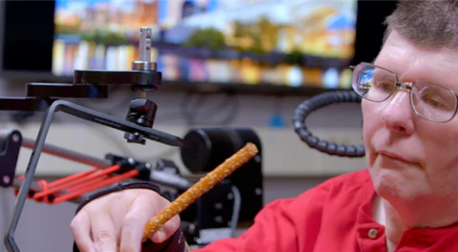 New technology allows tetraplegic man to move hand with thought