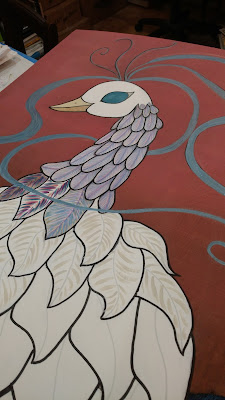 adding detail work to the white feathers