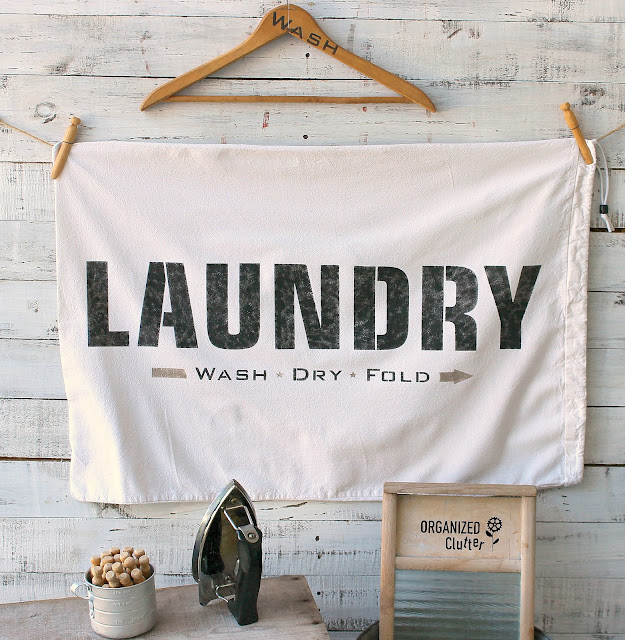 Thrift Shop Laundry Bag Becomes Laundry Room Decor With Stencils #oldsignstencils #fusionmineralpaint #laundrysign #laundryroom #laundryroomdecor #stencil #thriftshopmakeover