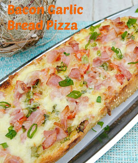 Bacon Garlic Bread Pizza - A Pizza,, but on Garlic Bread - the ideal weekend food and much quicker and easier to make than a traditional pizza