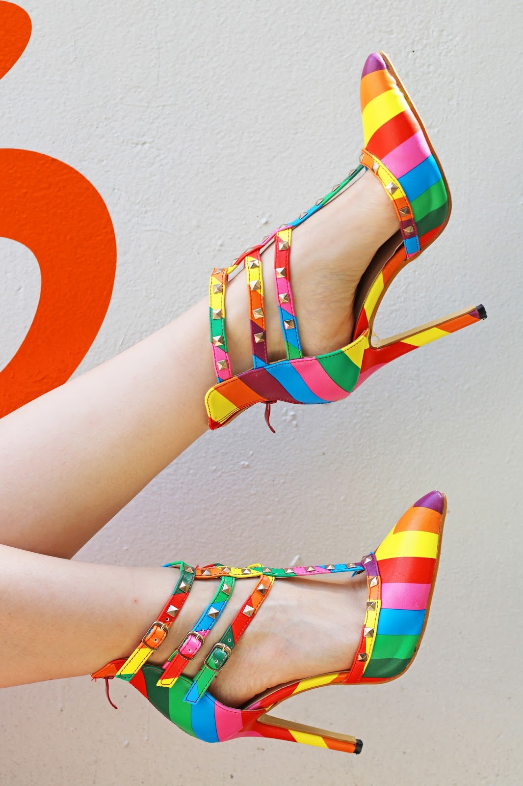 Loving these bright and bold rainbow heels!