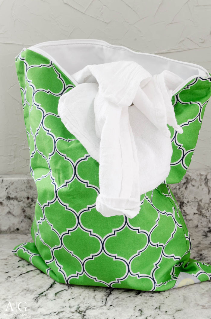 Do you need a place to keep all your damp towels and rags until laundry day? A wet bag normally used for diapers is the perfect solution.  |  www.andersonandgrant.com