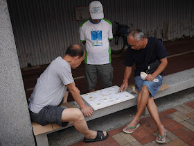 two men playing xiangqi in Sha Tin, Hong Kong