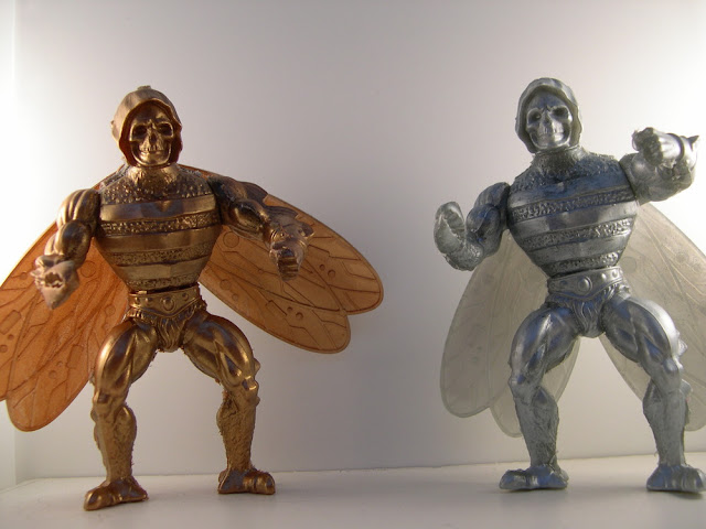 Off “Rejects of Eternia” Bootleg Masters of the Universe Action Figure by Giant Japanese Monster, Bad! - Bronze & Silver Colorways