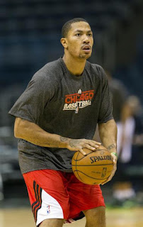 Derrick Rose shoots during warmups prior to the game against the Bucks. ( January 30, 2013 )