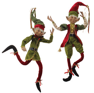 Large posable elf figures in red and green 