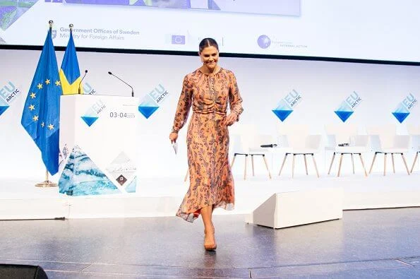 Crown Princess Victoria wore H&M print silk dress and Gianvito Rossi pumps, and Kreuger Jewellery rose gold poppy earrings
