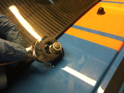 Removing these nuts loosens the wiper spindles from the scuttle.