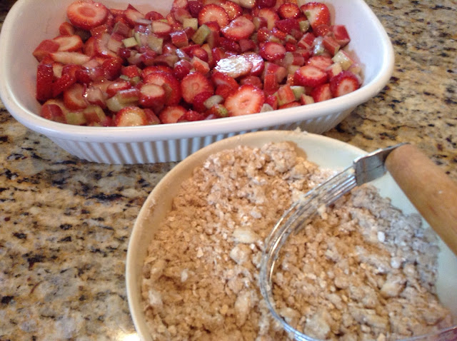 Strawberry Rhubarb mixture in baking dish and crisp topping next to it