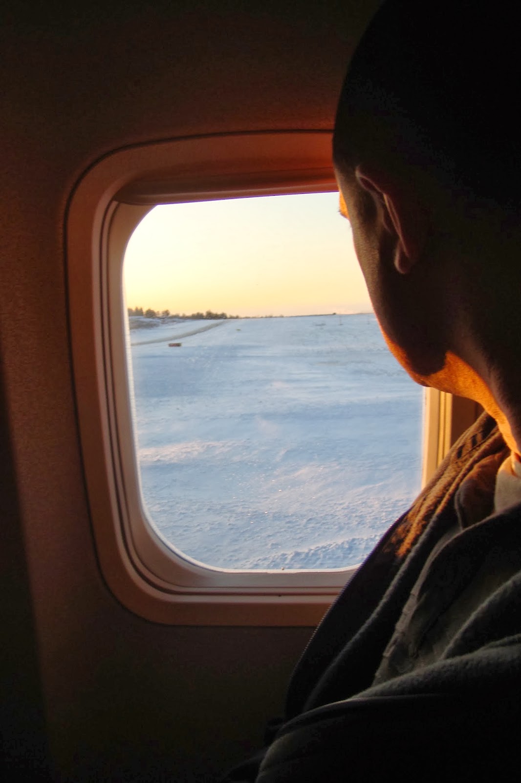 plane window and snow