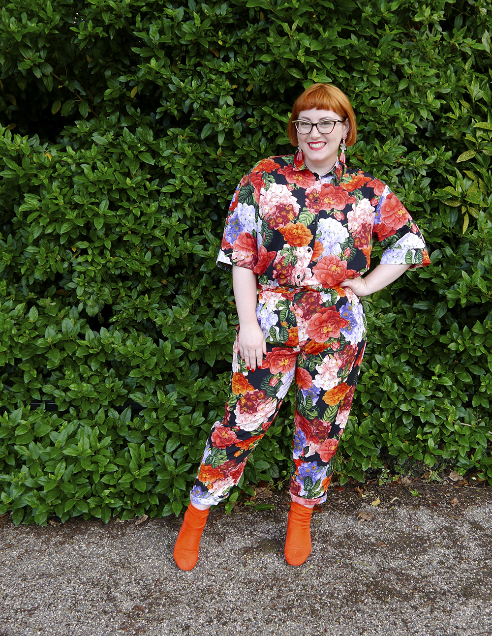 A full on floral outfit finished off with statement earrings by Julia de Klerk Full length outfit featuring floral print shirt and matching trousers from Monki