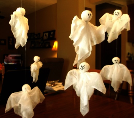 DIY Halloween hanging spooky ghost craft for kids 16 DIY Halloween ghost craft ideas for kids to make. DIY Paper towel ghost for Halloween. Halloween Creative and funny ghost craft ideas. Easy to make DIY Halloween funny Paper craft ghost 2018. Halloween paper craft ghost for outdoor decoration. Preschool paper ghost craft ideas for kids to make. Spooky ghost craft decoration for home. Paper craft for indoor decoration. Scary Halloween craft decoration lights.
