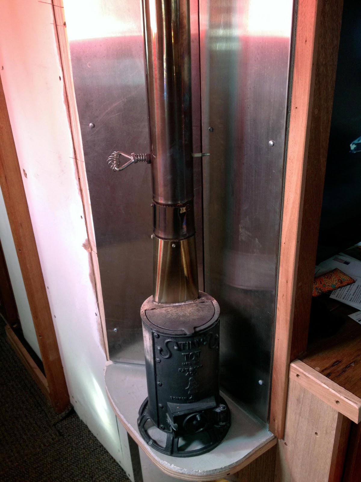 Tugboat Iver Installing a wood stove