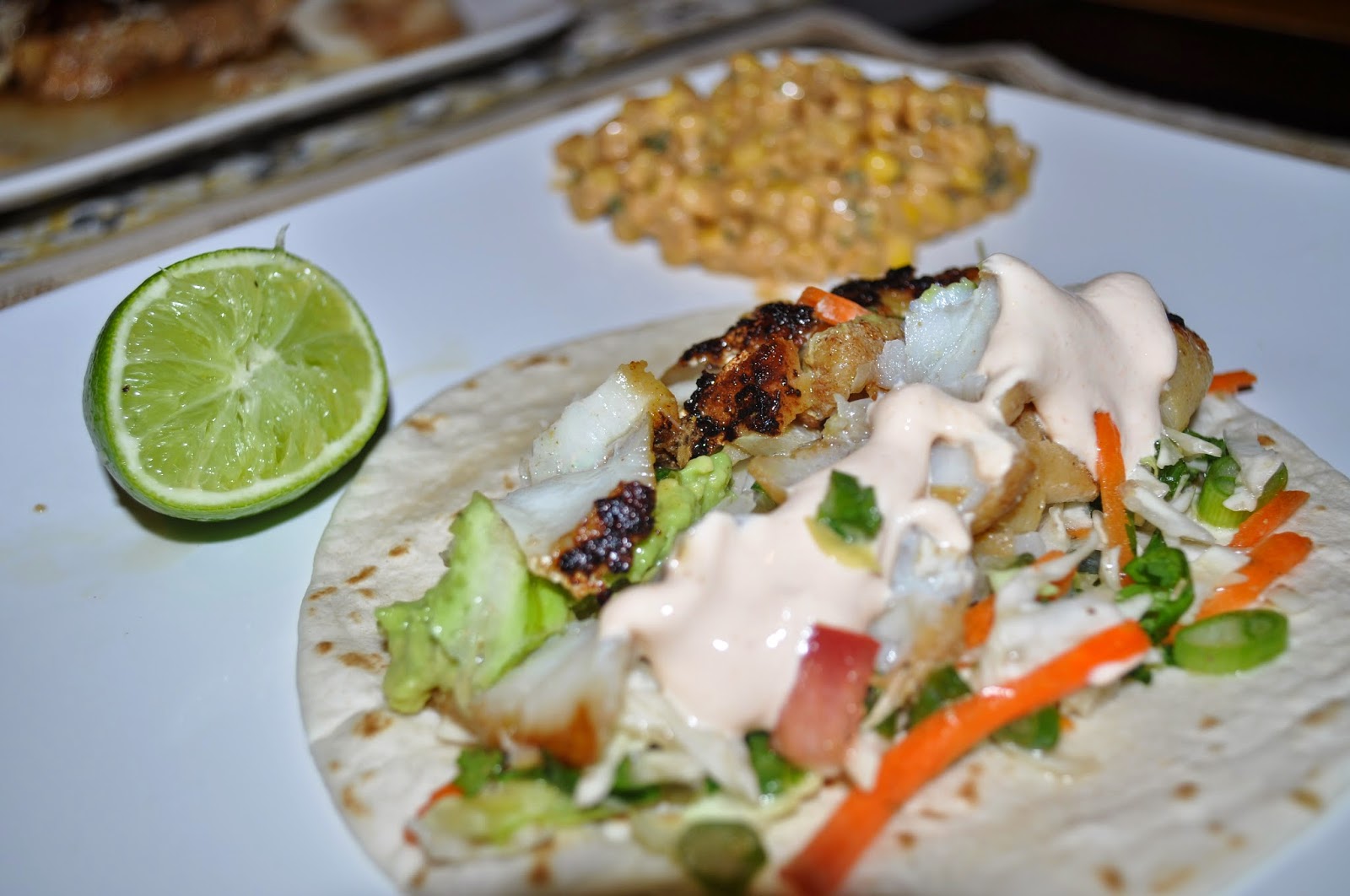 Carri Us Home Fish Tacos with Spicy Sriracha Sour Cream