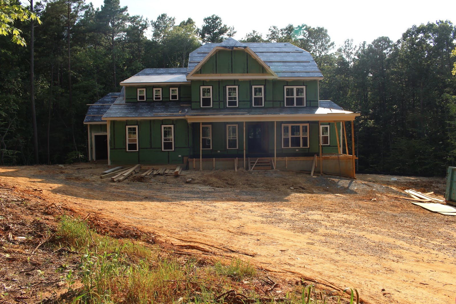 Gauch Hollow: Wiring, fireplace, boxing/siding started