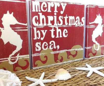 Christmas by the sea sign