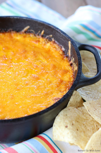 Warm and cheesy Taco Dip recipe from Served Up With Love