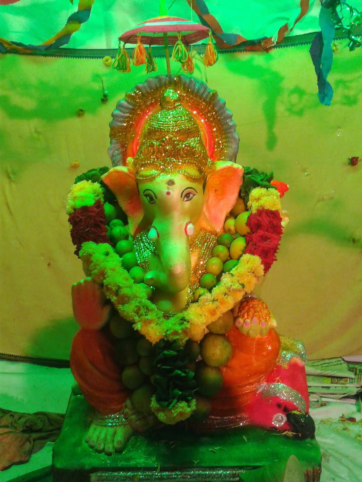 Vinayaga with green light effect.