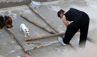 She is watched closely as she works She is watched closely as she works