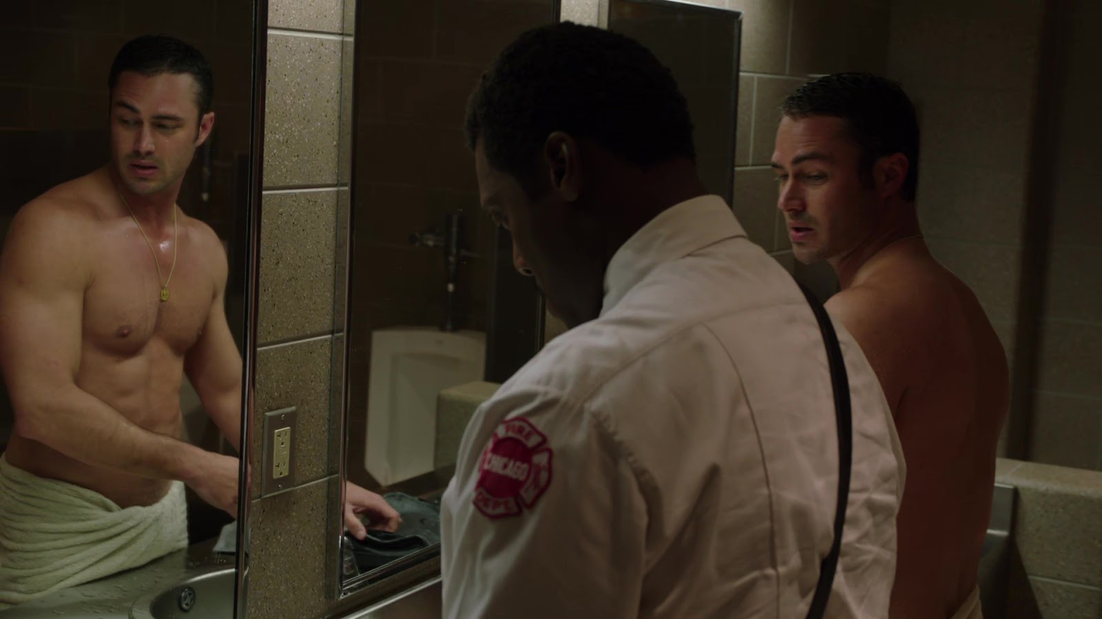 Taylor Kinney shirtless in Chicago Fire 1-08 "Leaving The Station"...