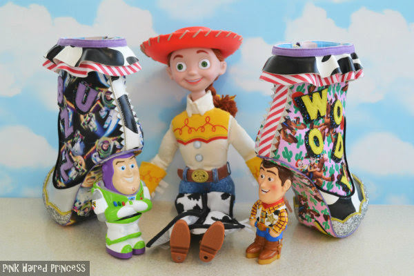 Irregular Choice You Are A Toy! Toy Story back side back view of Irregular Choice Toy Story heeled ankle boots with large Jessie figure in centre and sky background