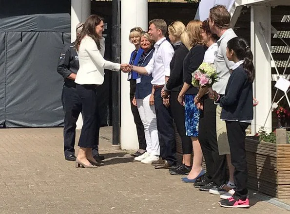 Duchess Catherine of Cambridge attends the 1851 Trust charity's Roadshow. Kate Middleton wore J. Crew Avery Heels