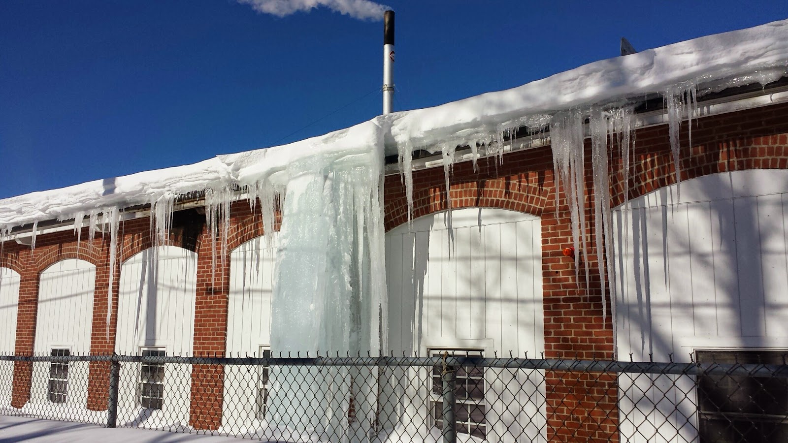 a monster icicle at Clark Cutler on Fisher St