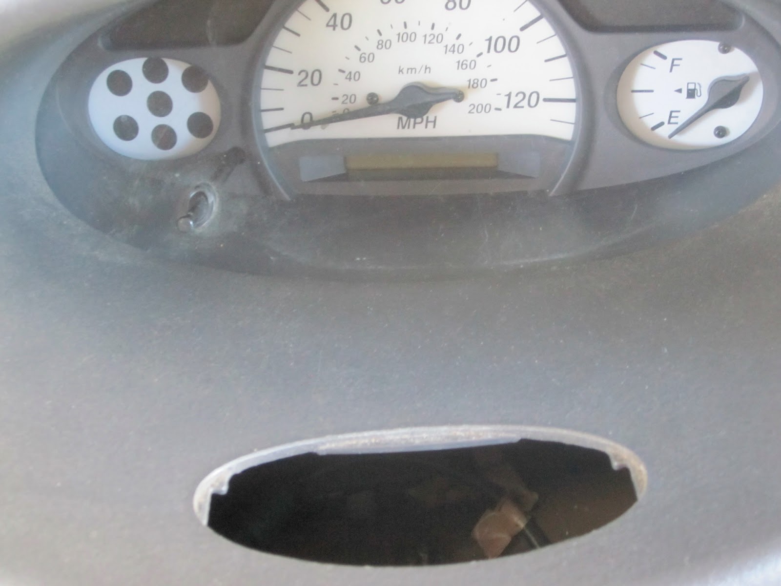 Mess of the Day PSA Changing a lightbulb behind the dash of a Toyota Echo