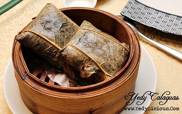 Crystal Jade Steamed Glutinous Rice with Conpoy wrapped in Lotus Leaf