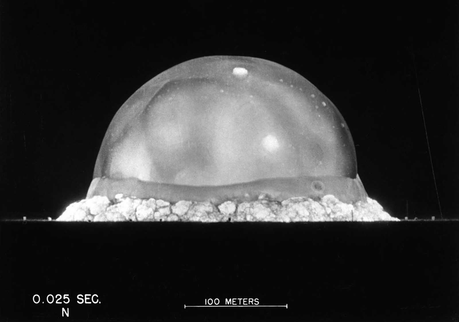 The expanding fireball and shockwave of the Trinity explosion, seen .025 seconds after detonation on July 16, 1945.