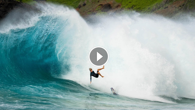 PRO SURFERS TAKE ON HUGE SHOREBREAK