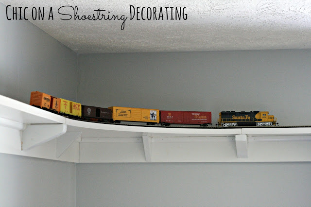 DIY HO Train Track shelf around room ceiling by Chic on a Shoestring Decorating