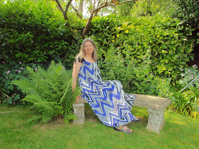 zig zag dress  from JD Williams website modelled in a green and leafy garden