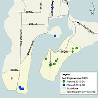 Blue and green dots mark the 14 properties receiving soil replacement in the southern end of Vashon-Maury Island. 