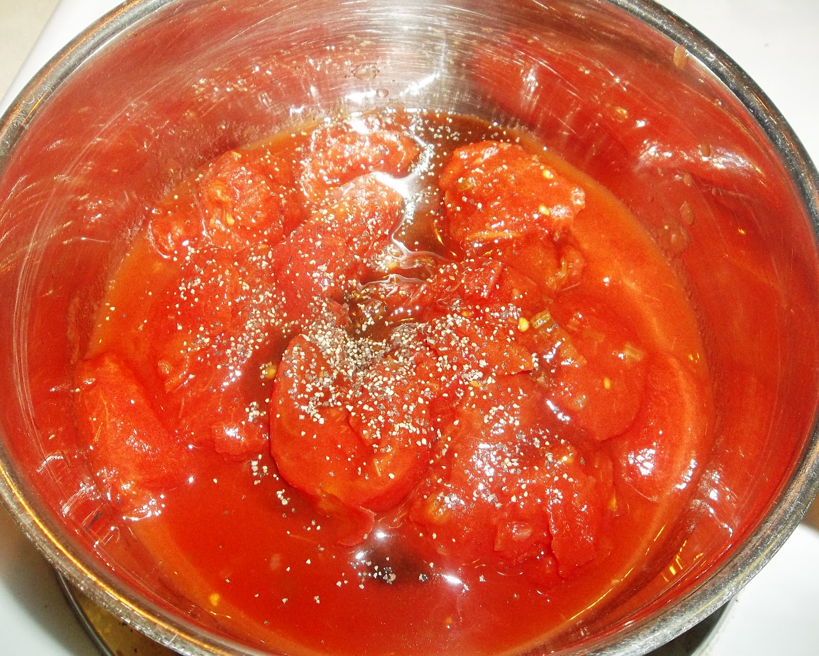 It's All About a Good Recipe Hamburger Steak topped with Stewed Tomatoes