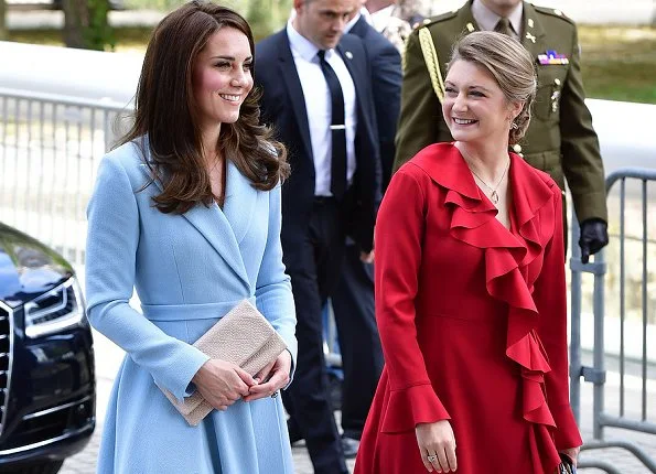 Kate Middleton wore a sky blue bespoke double wool crepe coat by Emilia Wickstead. Hereditary Grand Duchess Stéphanie wore Valentino ruffled dress