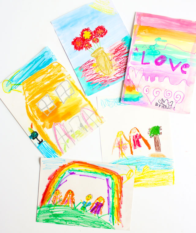 Turn kids art into colorful posters with pom-pom trim frames! Turn kids art into colorful posters with pom-pom trim frames!
