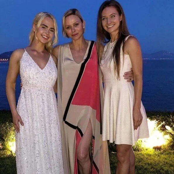 Princess Charlene wore a silk gown from Spring-Summer 2019 collection of Akris. Christos Fiotakis Elite fitness MC in Monaco